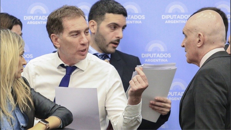 Diego Santilli y José Luis Espert en la Cámara de Diputados.